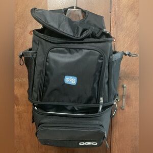 OGIO® Cooler Backpack is a versatile and stylish option for travel or casual use